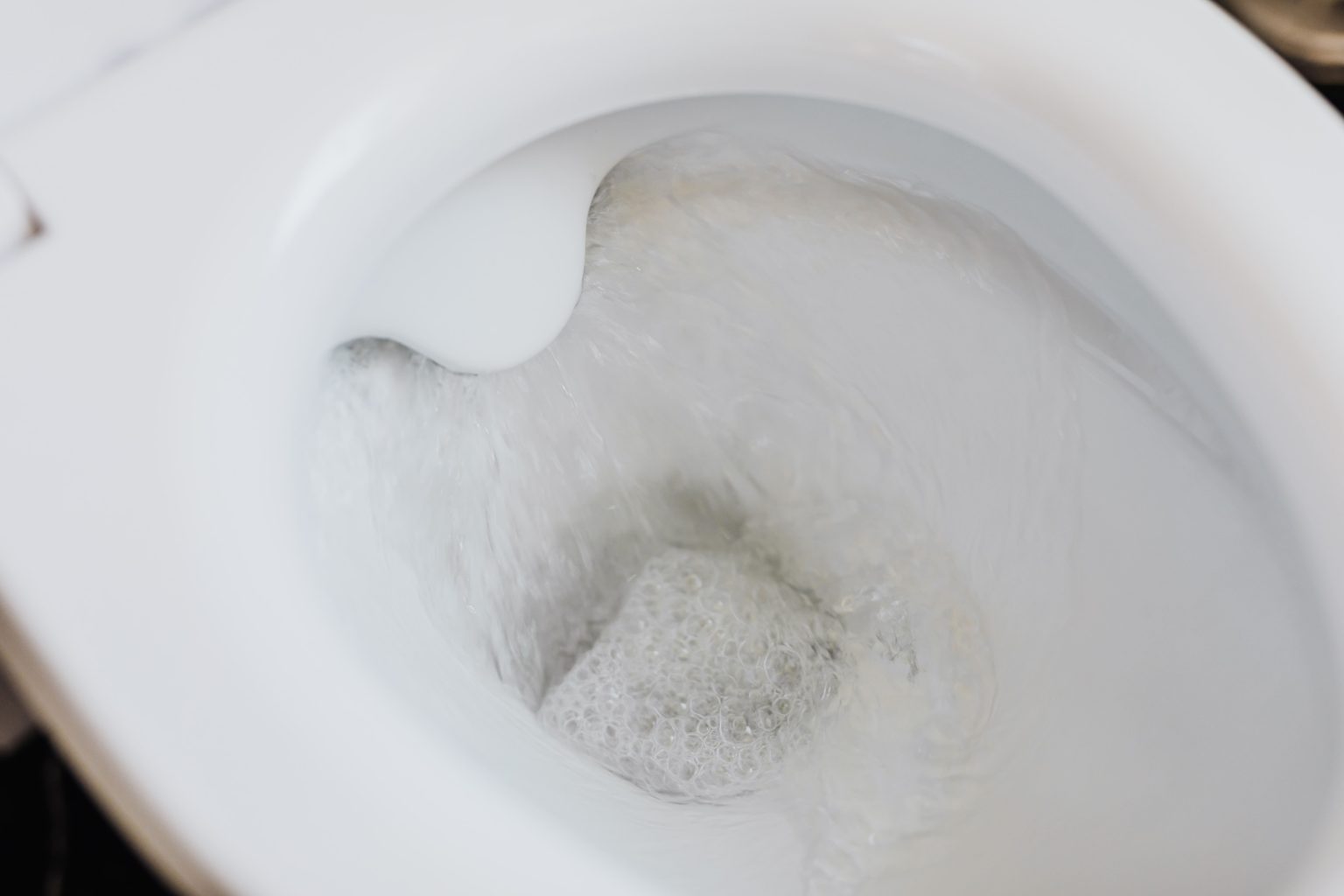 Who is responsible for a blocked toilet on rental property?